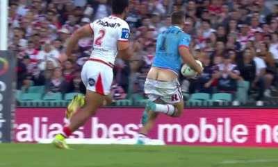 James Tedesco breaks through the line and lets it all hang out