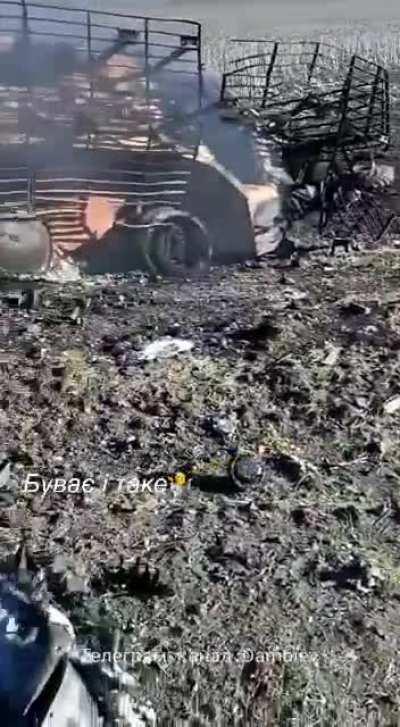 ua pov: Ukrainian soldier shoving destroyed Ukrainian BTR-4E and BMP-3 as well as place of impact of the artillery shell that destroyed them