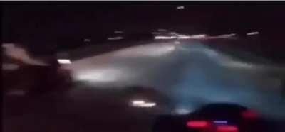 Motorcyclists speed on the freeway