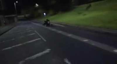 Riding past a speed camera.