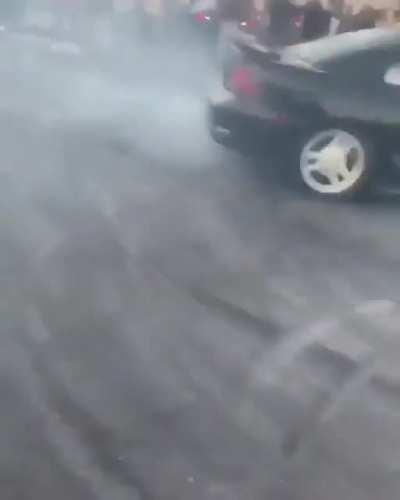 doing donuts in a car + alcohol + crowd