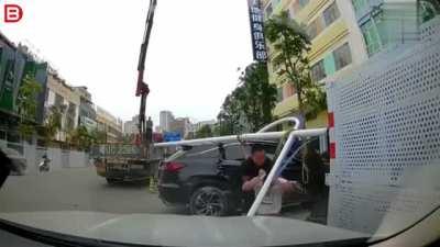 Lightpost lands on man's head.