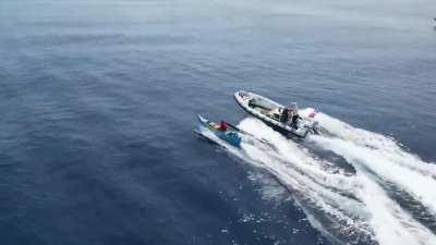 A brave Filipino fisherman outmaneuvering the Chinese Coast Guard inside the Philippine waters.