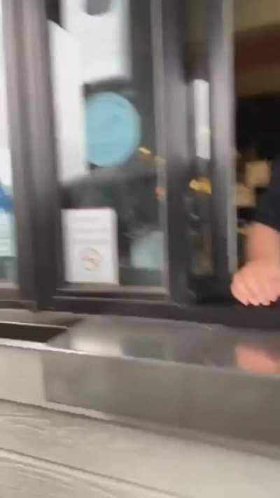 Karen in a car gets angry in the drive-thru.