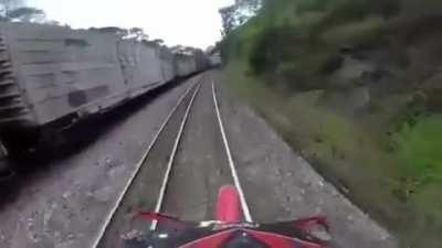 HMB while a motorbike down these active train tracks.
