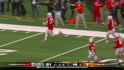 On fourth and goal, Ohio State’s Jack Sawyer strips Quinn Ewers and returns it for a touchdown, giving Ohio State a 28-14 lead with just over two minutes left in the fourth quarter.