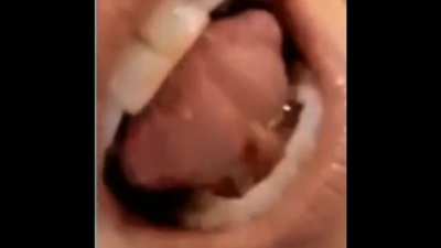 Kelly showing her tongue to friend on zoom!