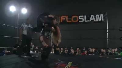 Big Toni Storm over petite Lufisto's shoulders