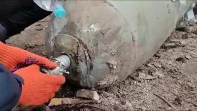 Diffusing a huge Russian bomb.