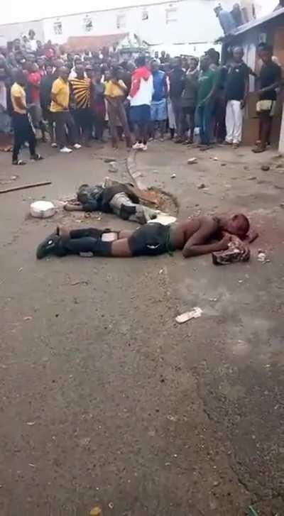 An African man being publicly executed (Probably homosexual)