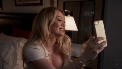 Hilary Duff shows off her busty cleavage in 