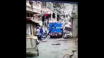 Man casually observes sewage truck and gets sprayed with sewage