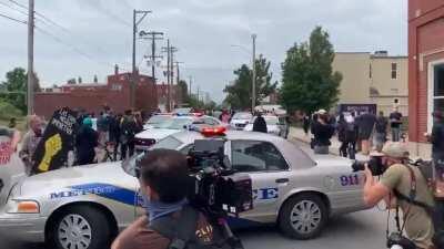 People protesting in Louisville in response to the verdict on the cops who killed Breonna Taylor