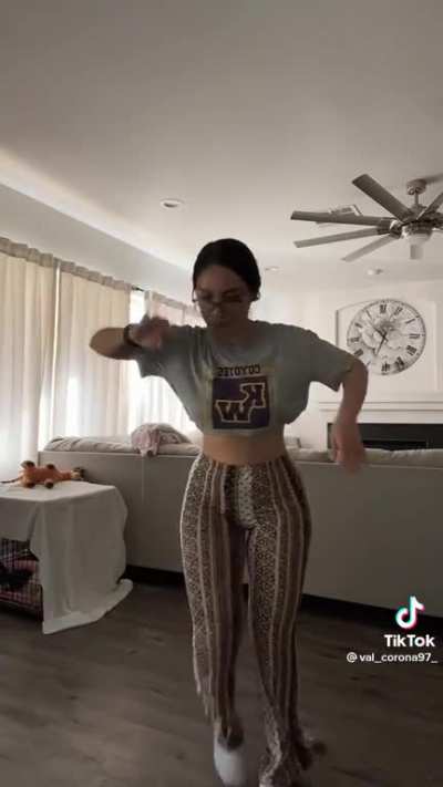 Sexy girl dances in flare pants