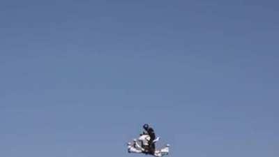 HMB while I fly this Dubai police vehicle with one hand