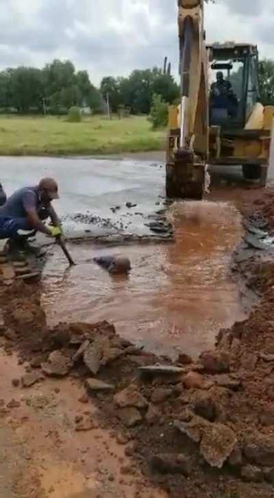 to scoop water out of a hole