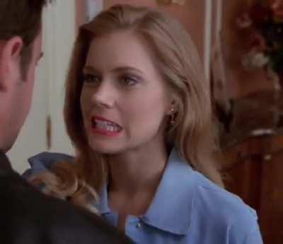 With Matthew Perry in 'Serving Sara', 2002.