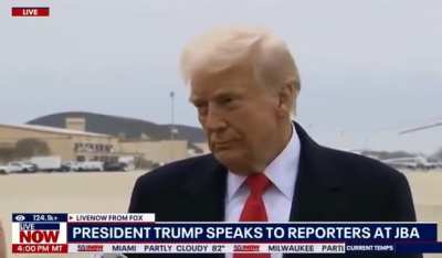 Trump hit in the face with microphone by reporter