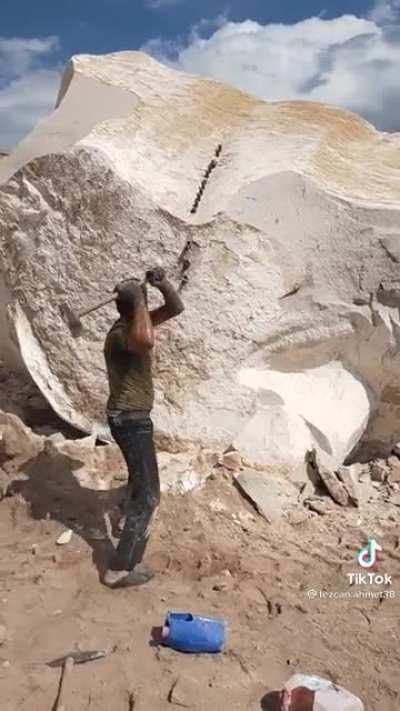 Splitting a boulder in two: