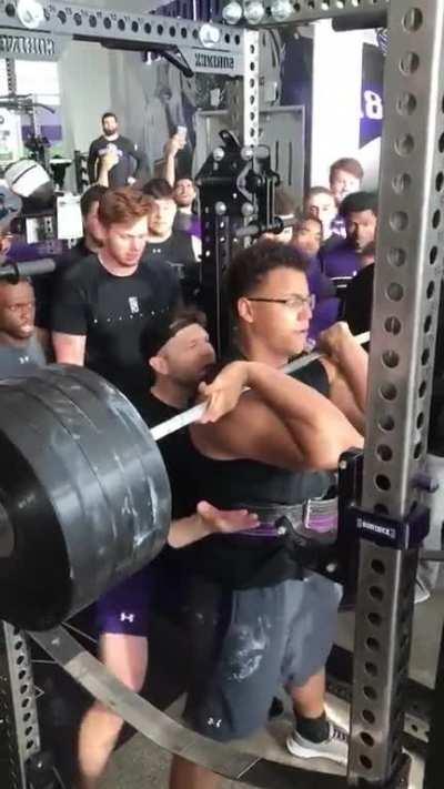 This guy squatted 450 pounds.