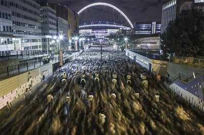 6 mounted (and 7 standing) policemen against a sea of humanity.