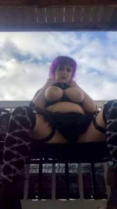 Goth babe pulling out her heavy hangers on the park bench!