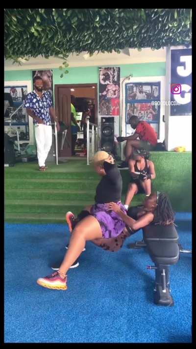 Lesbian fitness model humping her big booty workout partner in the gym