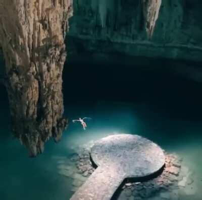 🔥 Swimming in a serene cave