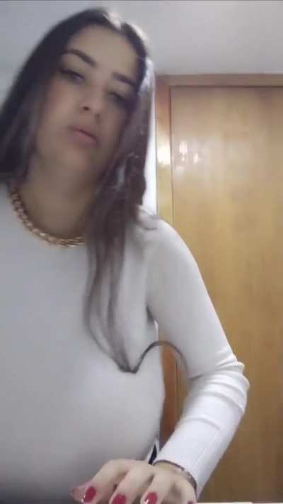 Bulging out of her bra!