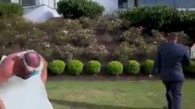Groom sees his best friend in wedding dress.