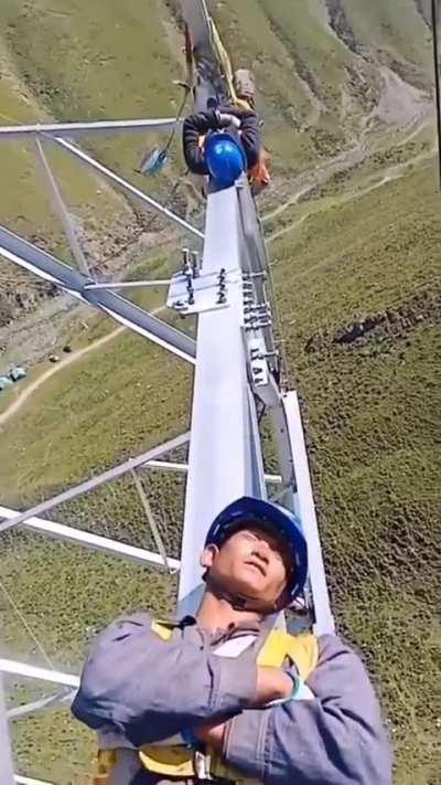 Power line workers in China taking a break in between busy operation shifts.

