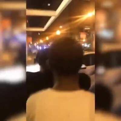 Someone using an Audi to ram the showcase of a store to help protesters loot it. Notice the lack of social distancing, too