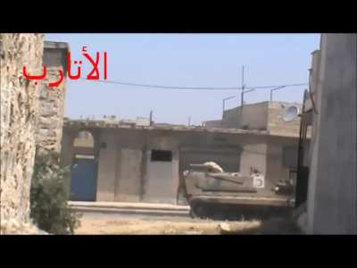 Aleppo, Al-Atarib: A sniper targeting one of Assad's soldiers on a tank -  11-26-2012






