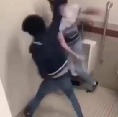 Brutal beat down in school bathroom