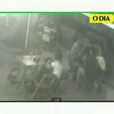 Man is beaten up after hitting his wife in a restaurant in Brazil