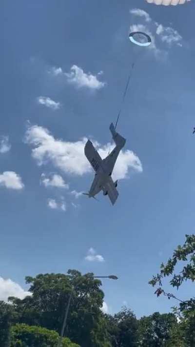 Parachute on falling plane saves man's life