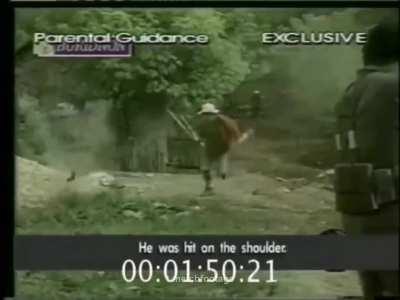 Philippines police gun down multiple cultists who charge at them with knives and fire at them with homemade guns. 16 cultists and 4 policemen were killed. Pangantucan town, Bukidnon, Philippines. August 12th, 2000.