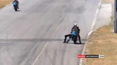 Biker gets on another biker's bike
