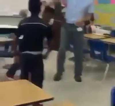 Two lil niggas brawling