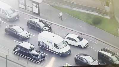 BBC broadcast of King’s convoy. This old man decided to sprint across the highway to get a good photo.