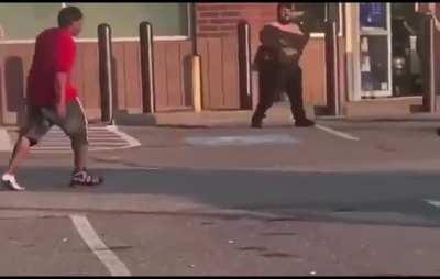 Fight Gets Broken Up By Car + Guy's Shoe Blown Off