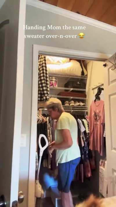 She keeps handing out the same sweater to her mum over and over again