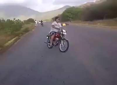 Showing off a bike stunt