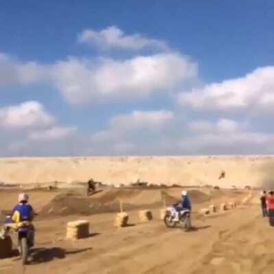 Most riders would’ve doubled, the faster ones would triple. But Rookie White, at the age of 16, hit it 5th gear pinned and quaded it, miraculously landing perfectly on the sweet spot without casing the next face.