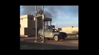 Kurdish anti Terror Forces engage an ISIS team on top of a rooftop with 50 Cal Heavy Machine gun fire and grenades. (Syria, Date Unknown)