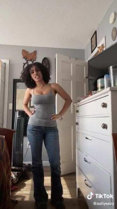 Tank top and lowrise jeans