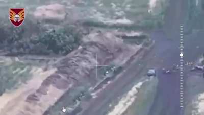 Drone footage of a Russian Zhiguli transporting ammunition getting attacked by a Ukrainian FPV quad. The crew tries to leave the car and takes cover in a nearby ditch to not get killed by the massive explosion.