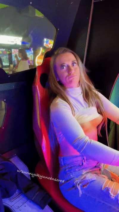 Tits out at the arcade