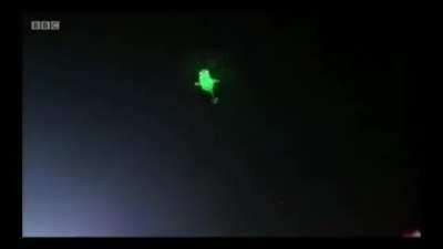 Egyptian protesters light up military helicopters with thousands of laser pens
