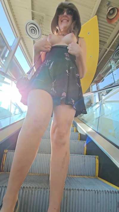 The escalator was going up, and so was my skirt! [GIF]